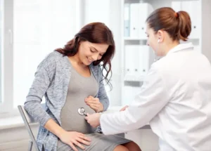 gynecologist-doctor-pregnant-woman-hospital-pregnancy-gynecology-medicine-health-care-people-concept-stethoscope-70948901